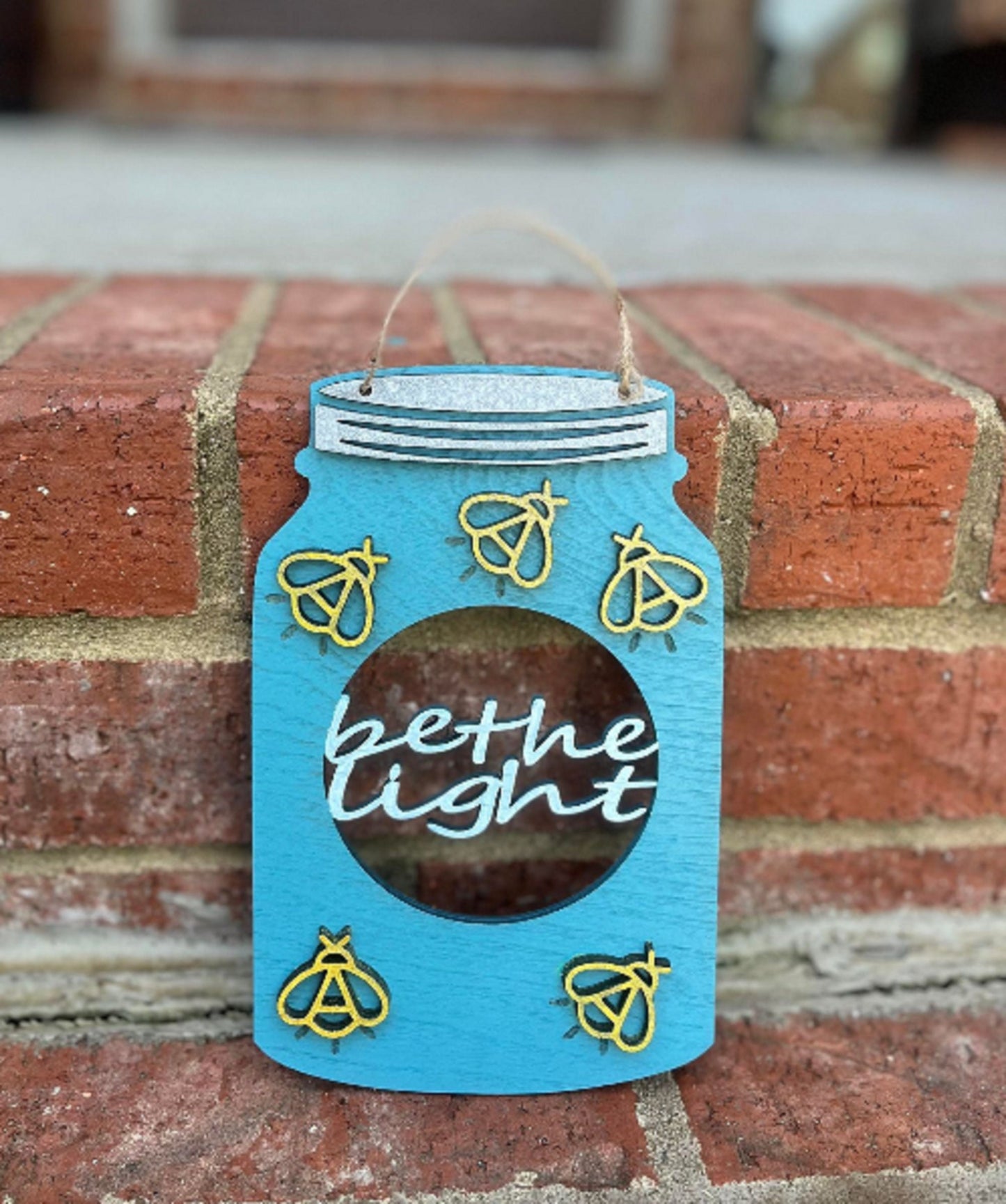 Be The Light Firefly Door Hanger